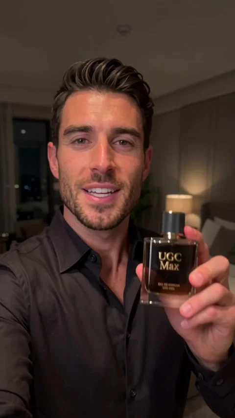 UGC Max AI-generated ad example featuring a presenter holding a perfume bottle